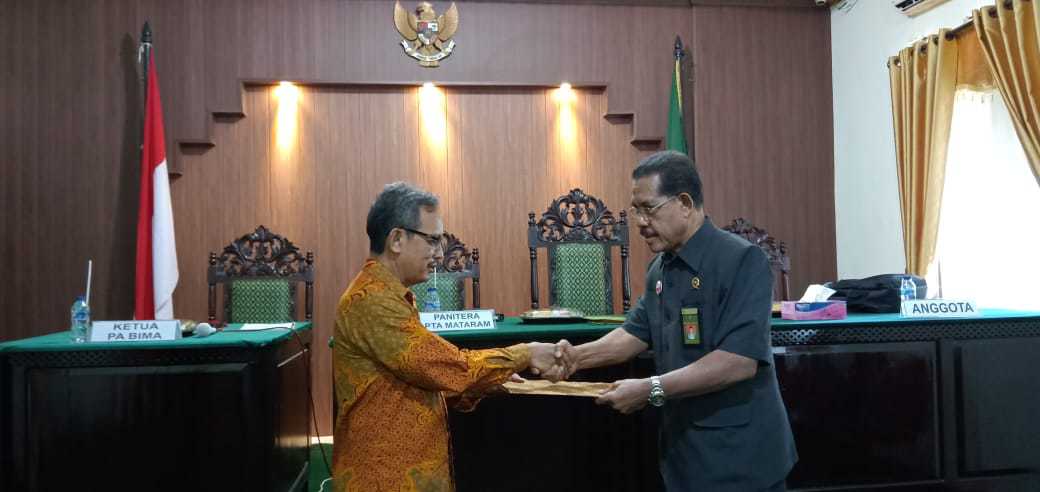 Serah terima laporan